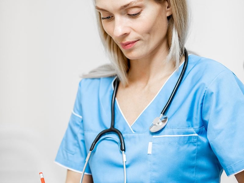 nurse-portrait-during-the-paper-work-2021-09-24-04-26-05-utc.jpg
